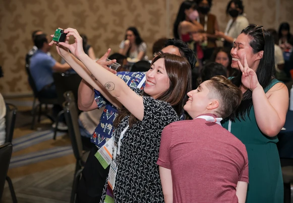 Spectrum Scholars take a selfie with film camera