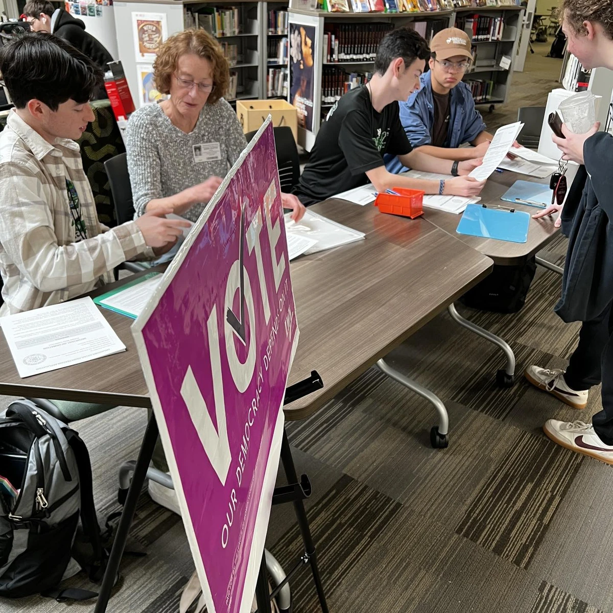 Volunteers at Norman North High School in OK registering voters